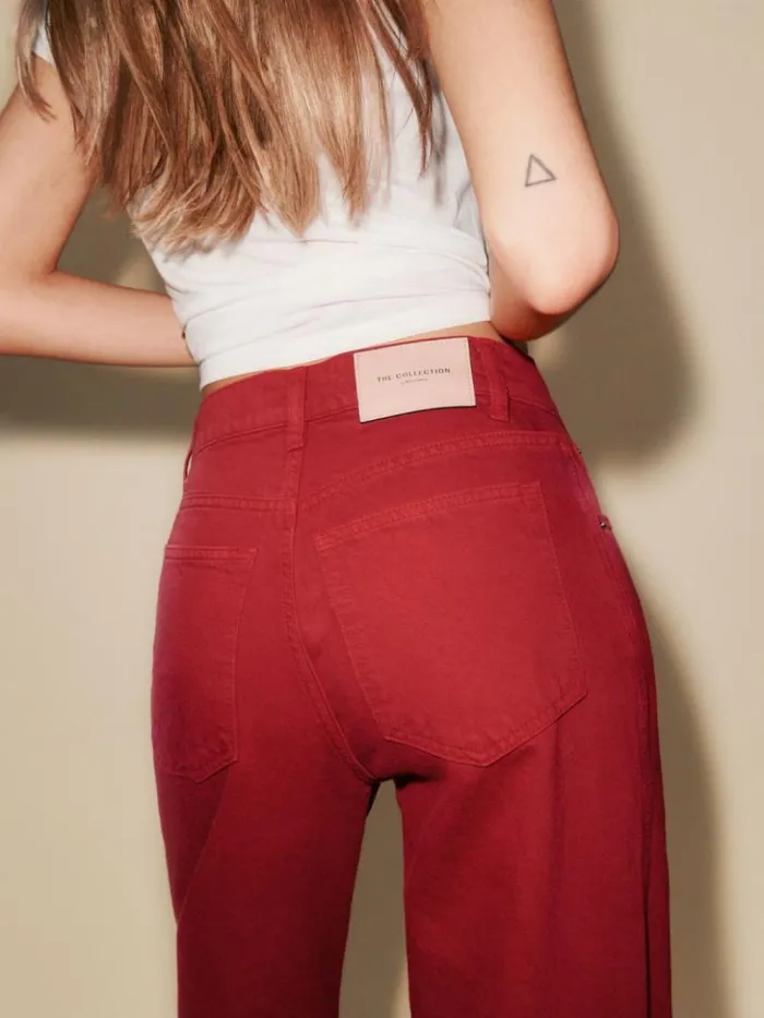 Clothing The Reformation The Magnolia Mid Rise Bow Jeans Lipstick